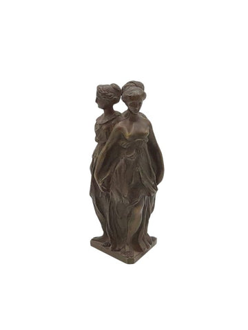 Small statue representing The three graces. Bronze
