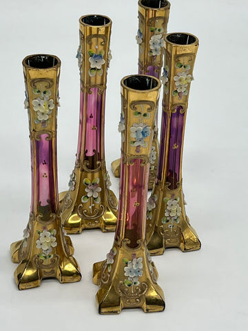 Five small vases decorated with finishing