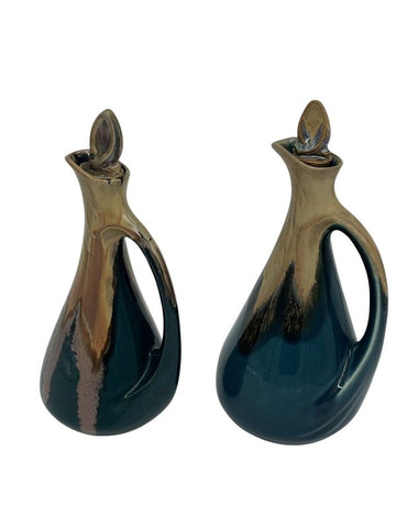 unique enameled stoneware carafes complete with their stoppers, signed “Denbac” under the base