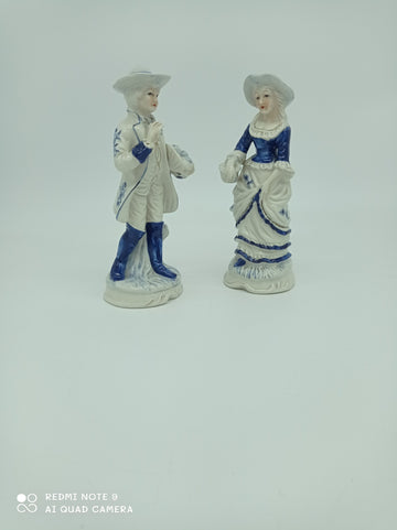 Porcelain marqui couple signed