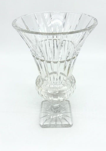 Elegant cut crystal vase on pedestal