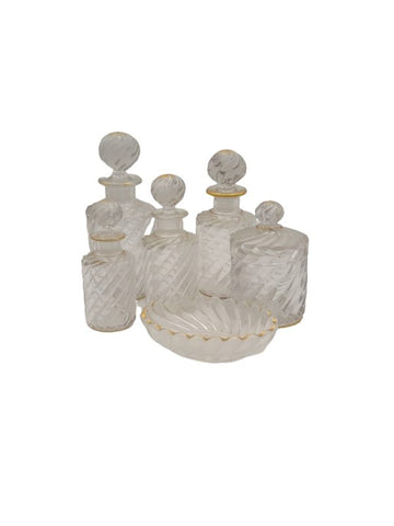 BACCARAT. Series of moulded crystal toilet bottles