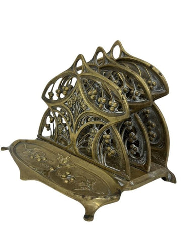 Amazing bronze letter holder decorated with flowers and stylises plants early 20th century