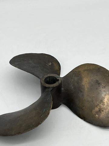 A brass propeller