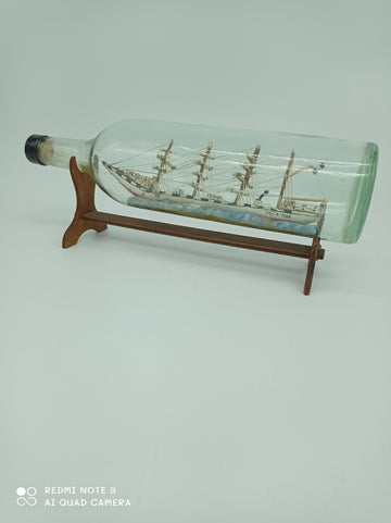 Boat in bottle showing a 4 masts