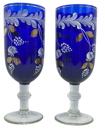 Elegant Pair of Crystal stemmed glasses in blue crystal with foliage and flower decorations