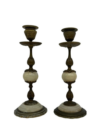Beautiful pair of candle holders resting on a frieze with a pattern wrapped in bronze at the beginning of 20th century