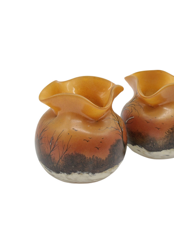 Unique Pair of spherical vases with quadrilobed necks in enamelled and painted glass with a winter landscape design on an orange background. Signed on the body.Legras