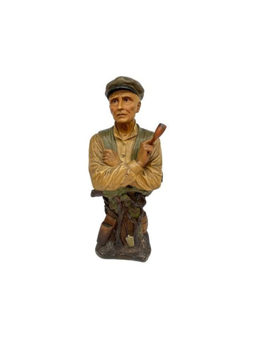 Statue representing a sailor with his typically French pipe